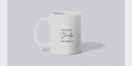 A video of sublimated mug with an initial on one side and scripture on the other
